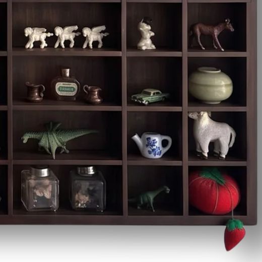 Rooms holding a tiny car and a teapot