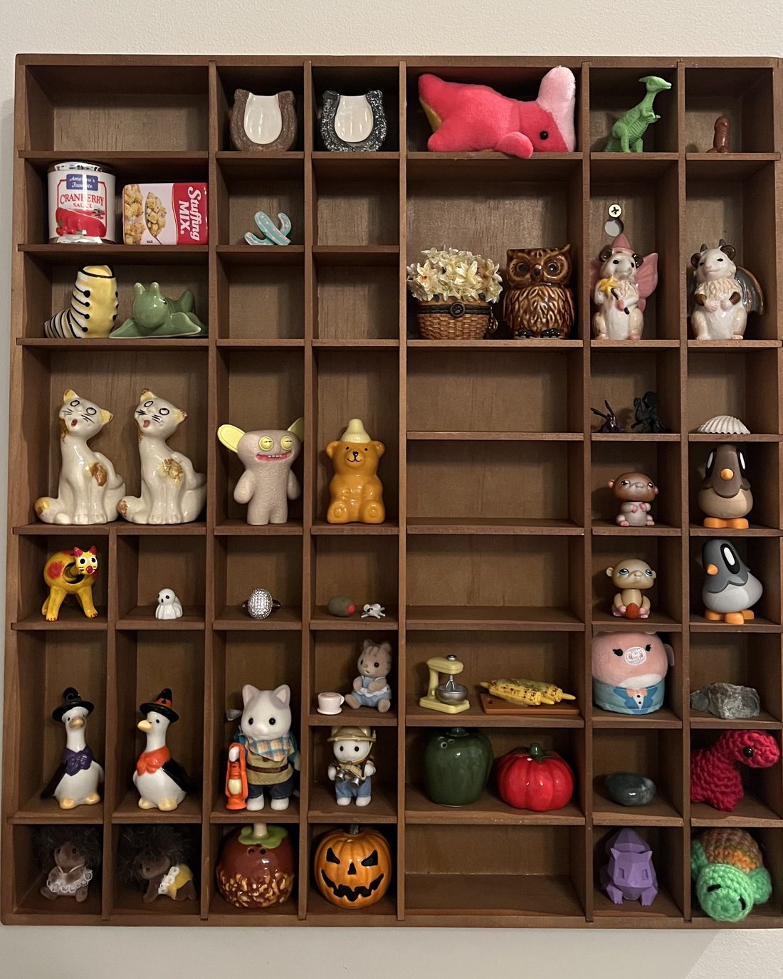 Kaylee's Wondershelf with ceramic animals and tiny food