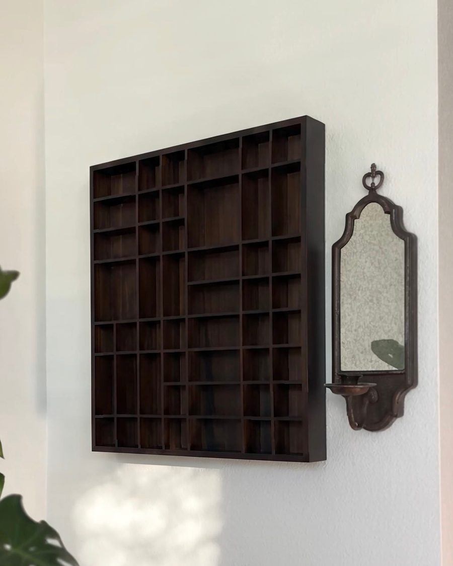 The empty shelf on the wall